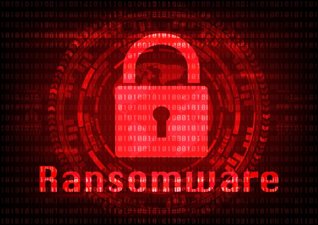 Et digitalt billede med en rød baggrund, der viser en hængelås og teksten "Ransomware". Billedet symboliserer cybersikkerhedstrusler og ransomware-angreb.